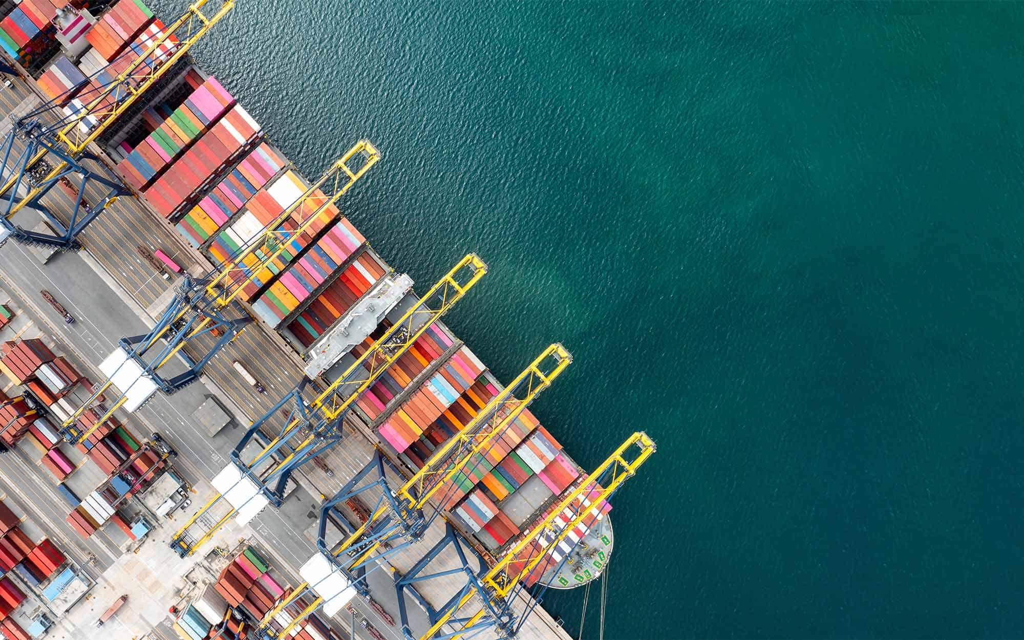 Container-ship-loading-and-unloading-at-sea-port
